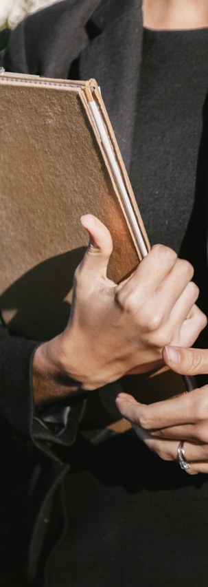 Craftsperson holding a framed picture