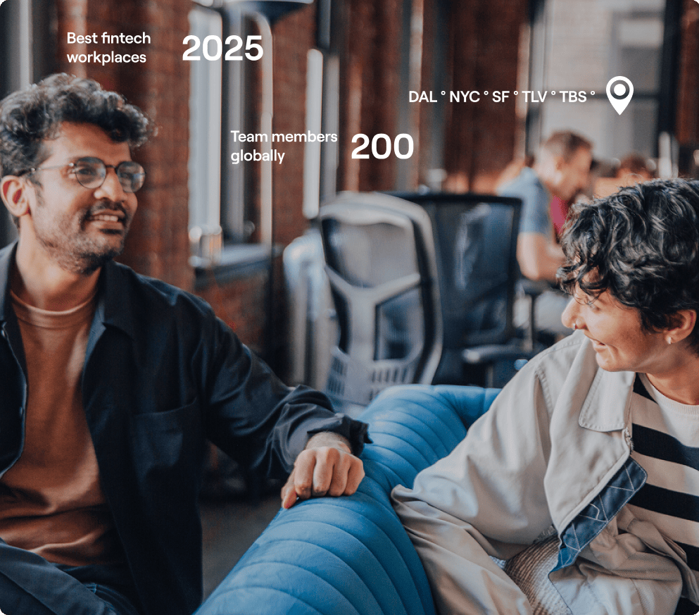 Two team members talking on a sofa — Best fintech workplaces 2025, 200 team members globally, DAL · NYC · SF · TLV · TBS